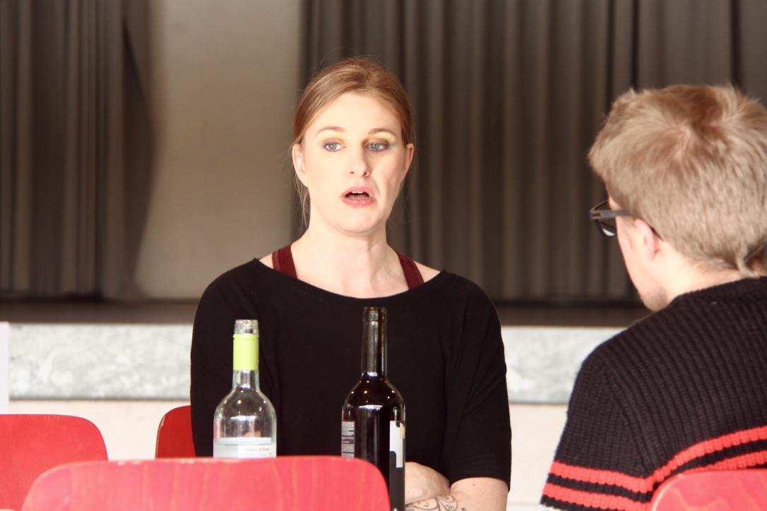 A man and a woman at a dinner table